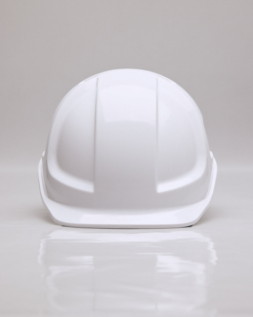 White safety helmet, symbolising protection and safety, like a condom, reflecting Jonny's commitment to safe sex practices.